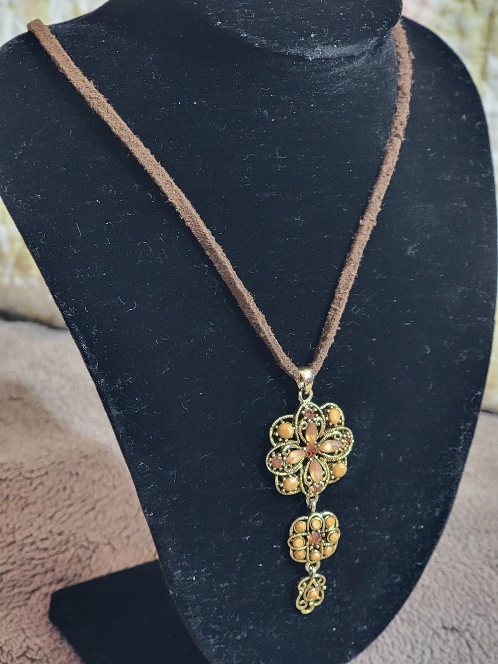 Gold-Tone Floral Pendant Necklace on Brown Suede Cord